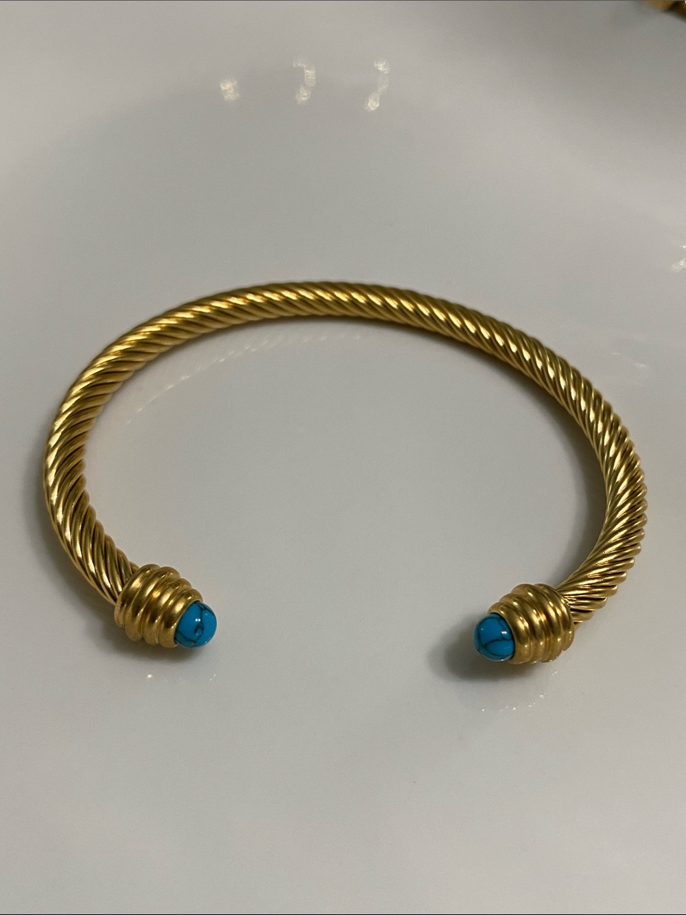 Stainless Steel Twisted Cable Cuff Bracelet with Blue Cabochon